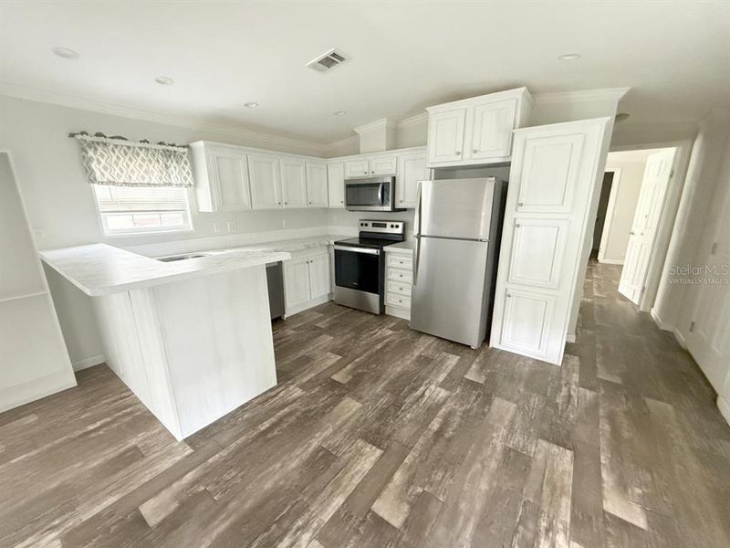 Furnished interior view inside a new home in , Lakeland (Image 9). Furnished interior view inside a new home in , Lakeland (Image 9).