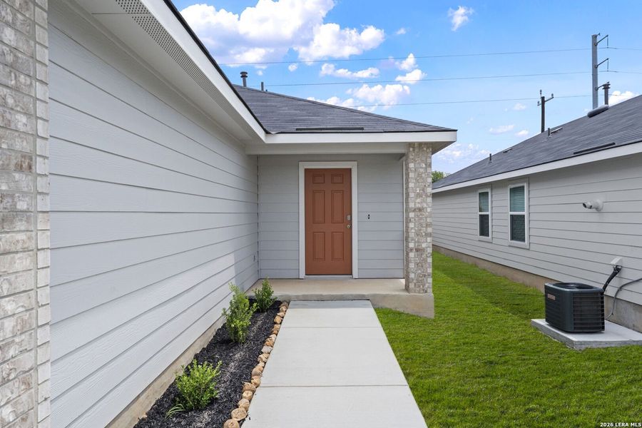 Exterior details and patio area of a home in Hickory Ridge, Elmendorf (Image 19). Exterior details and patio area of a home in Hickory Ridge, Elmendorf (Image 19).