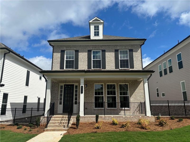 Front exterior of a new home in Brackley Single Family, Cumming, GA, highlighting curb appeal (Image 30).
