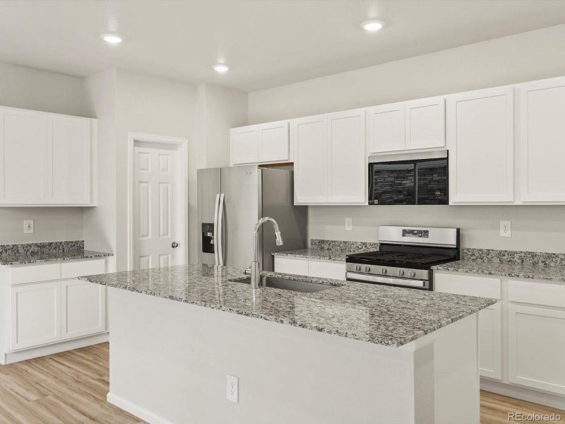 Furnished interior view inside a new home in Horizon Uptown: The Mountain Collection, Aurora (Image 7). Furnished interior view inside a new home in Horizon Uptown: The Mountain Collection, Aurora (Image 7).