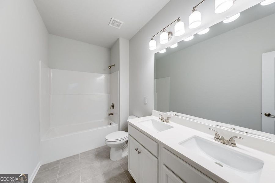 Furnished interior view inside a new home in Chimney Oaks Townhomes, Homer (Image 8).