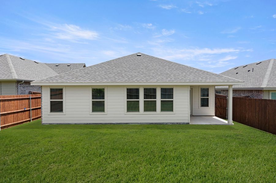 Front exterior of a new home in De Berry Reserve, Royse City, TX, highlighting curb appeal (Image 26).