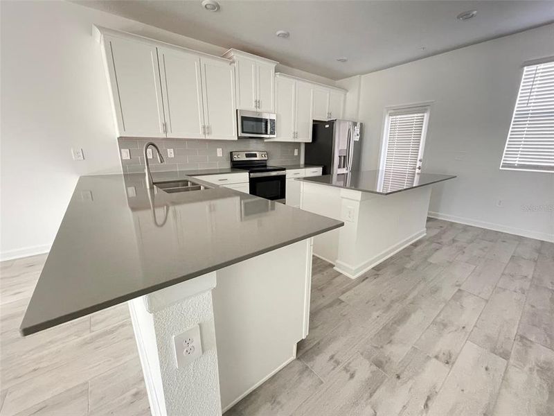 Furnished interior view inside a new home in , Orlando (Image 4). Furnished interior view inside a new home in , Orlando (Image 4).