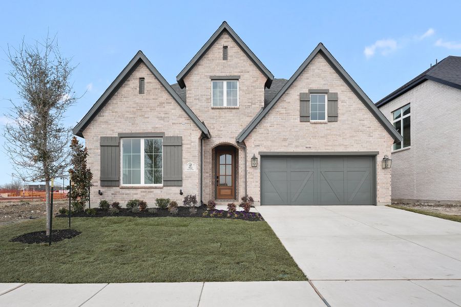 Front exterior of a new home in Hillside Village, Celina, TX, highlighting curb appeal (Image 1). Front exterior of a new home in Hillside Village, Celina, TX, highlighting curb appeal (Image 1).