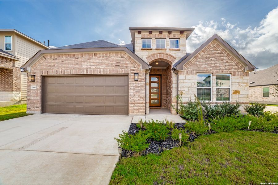 Front exterior of a new home in Veranda, San Antonio, TX, highlighting curb appeal (Image 2). Front exterior of a new home in Veranda, San Antonio, TX, highlighting curb appeal (Image 2).