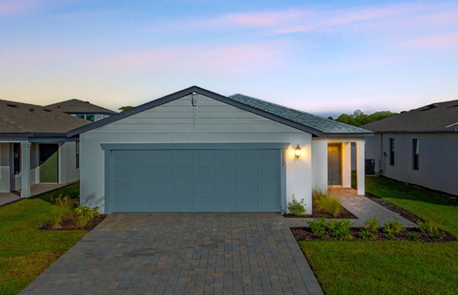 Front exterior of a new home in Caloosa Cove, Labelle, FL, highlighting curb appeal (Image 19).
