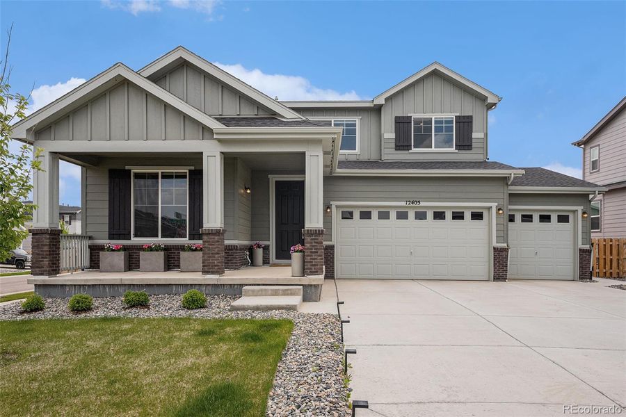 Front exterior of a new home in , Commerce City, CO, highlighting curb appeal (Image 20).