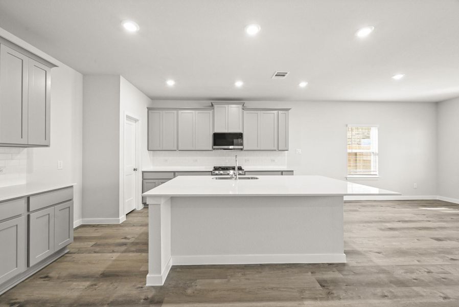 Furnished interior view inside a new home in Sunterra, Katy (Image 7).