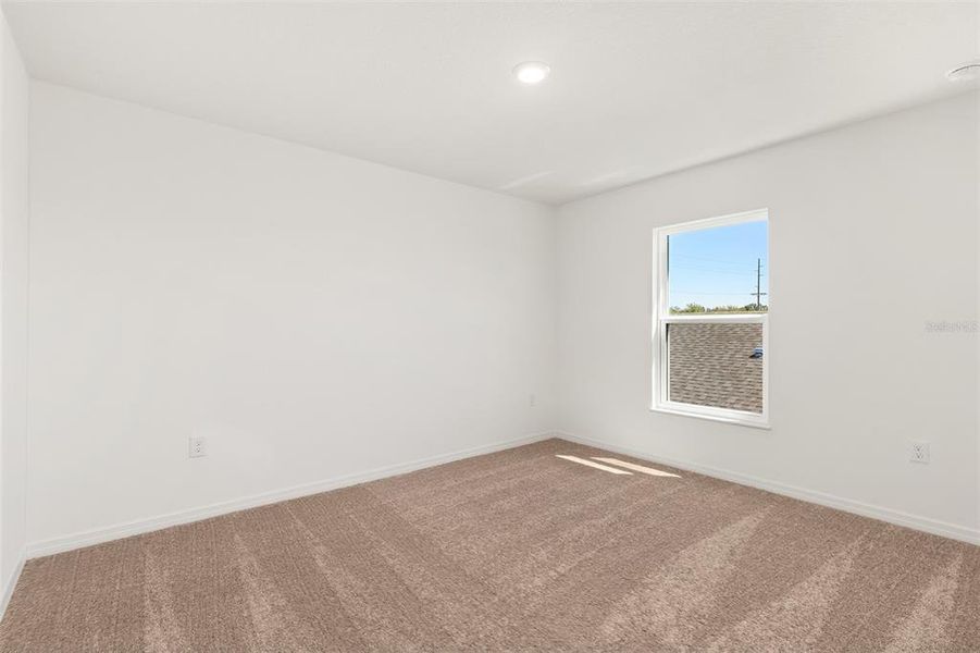 Spacious, unfurnished interior of a new home in Peach Crossings, Winter Haven (Image 20).