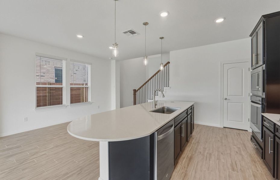 Furnished interior view inside a new home in Wolf Ranch, Georgetown (Image 5).
