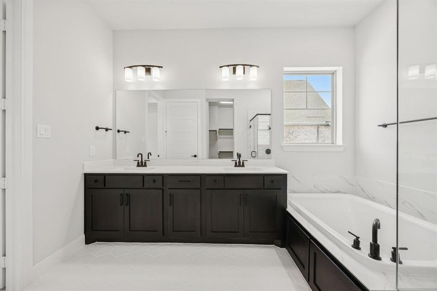 Furnished interior view inside a new home in Elements at Viridian - Garden Series, Arlington (Image 10). Furnished interior view inside a new home in Elements at Viridian - Garden Series, Arlington (Image 10).