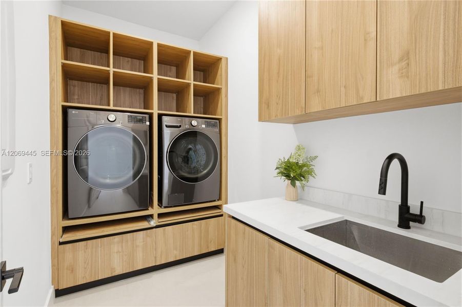 Additional features include stylish laundry room w/ custom cabinetry, utility sink, washer & dryer, designer lighting throughout, modern interior doors, floating vanities, upscale plumbing fixtures, custom built-in closet systems, extensive storage & meticulous attention to detail in every room Additional features include stylish laundry room w/ custom cabinetry, utility sink, washer & dryer, designer lighting throughout, modern interior doors, floating vanities, upscale plumbing fixtures, custom built-in closet systems, extensive storage & meticulous attention to detail in every room