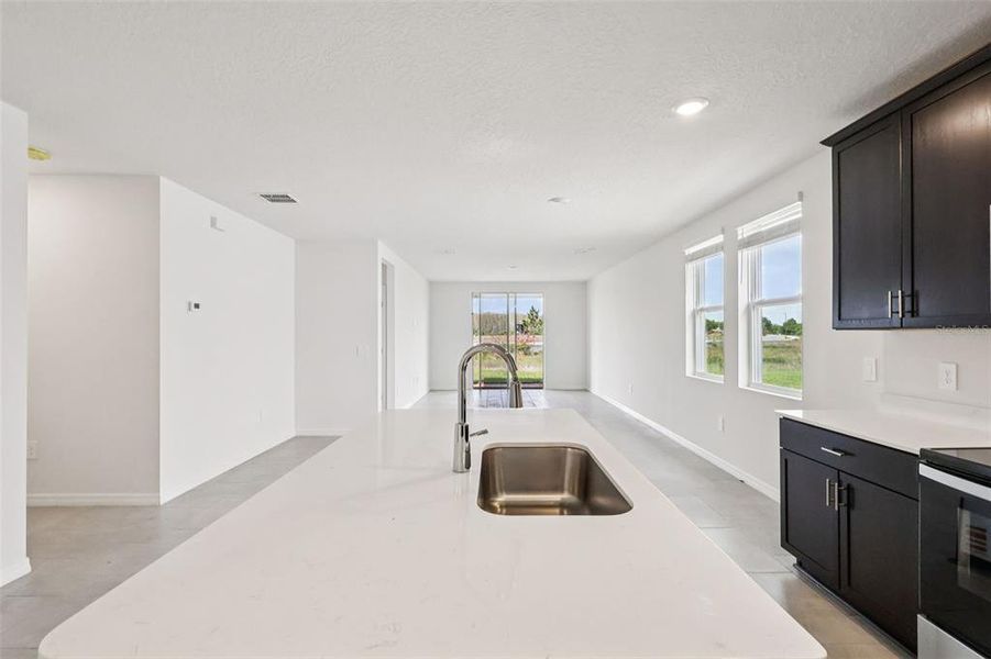 Furnished interior view inside a new home in The Meadow at Crossprairie, St. Cloud (Image 8). Furnished interior view inside a new home in The Meadow at Crossprairie, St. Cloud (Image 8).