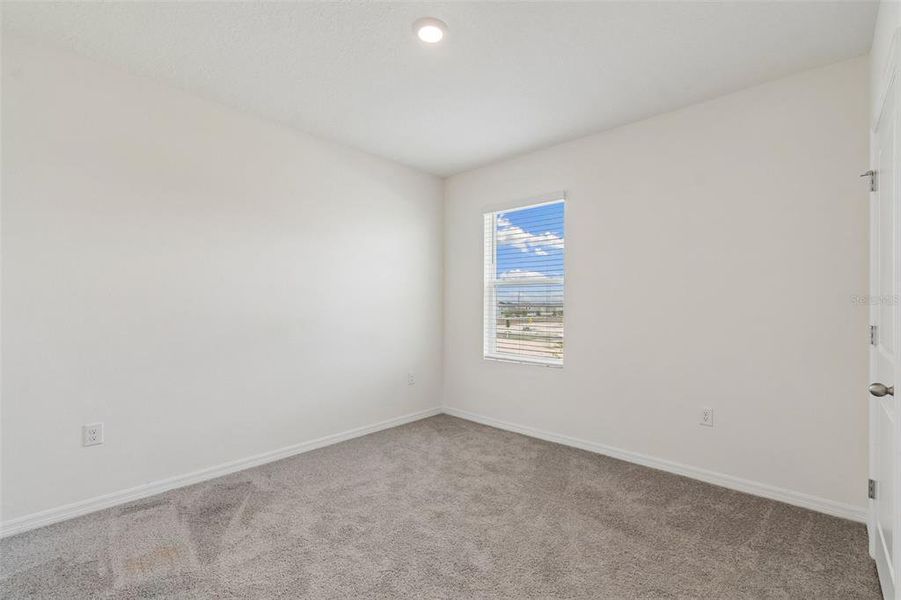 Spacious, unfurnished interior of a new home in Epperson, Wesley Chapel (Image 49).