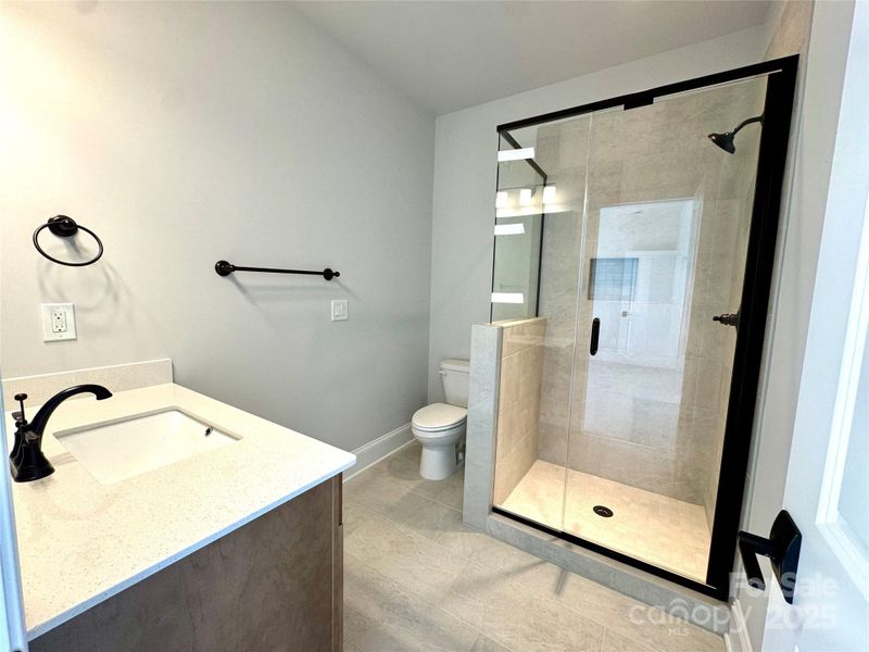 Furnished interior view inside a new home in Saddlehorn, Troutman (Image 13). Furnished interior view inside a new home in Saddlehorn, Troutman (Image 13).