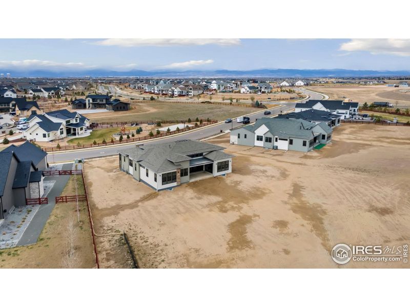 Exterior details and patio area of a home in Acadia at RainDance, Windsor (Image 15).