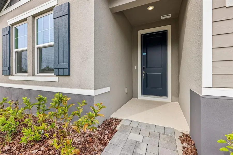 Exterior details and patio area of a home in , Ormond Beach (Image 3).