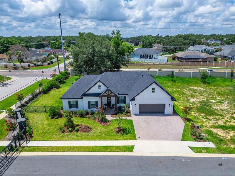 Front exterior of a new home in , Lakeland, FL, highlighting curb appeal (Image 30). Front exterior of a new home in , Lakeland, FL, highlighting curb appeal (Image 30).