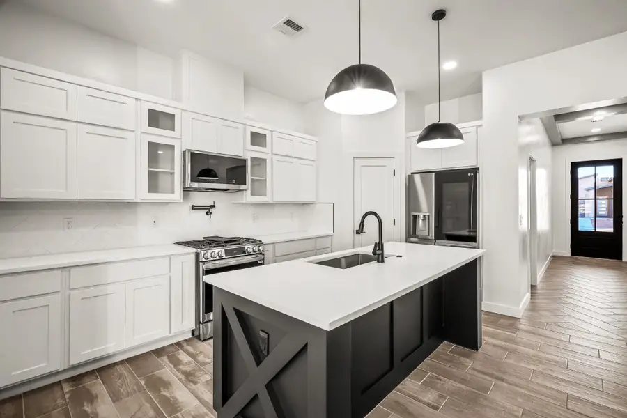 Furnished interior view inside a new home in Tierra Del Este 91, El Paso (Image 5). Furnished interior view inside a new home in Tierra Del Este 91, El Paso (Image 5).