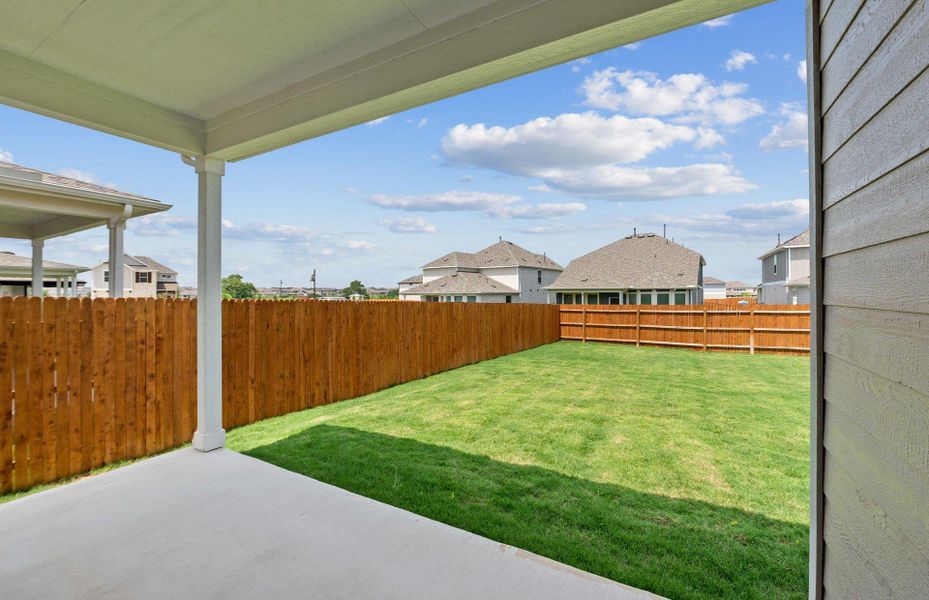Exterior details and patio area of a home in Santa Rita Ranch, Liberty Hill (Image 3).