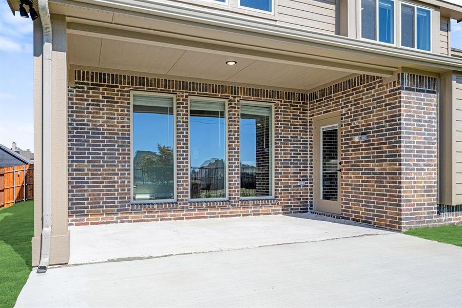 Exterior details and patio area of a home in Villages of Walnut Grove, Midlothian (Image 17).