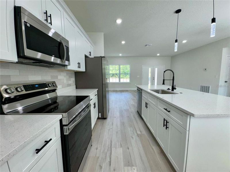 Furnished interior view inside a new home in , Citrus Springs (Image 9).