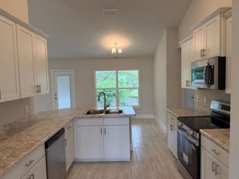 Furnished interior view inside a new home in St. James Park, Ocala (Image 5).