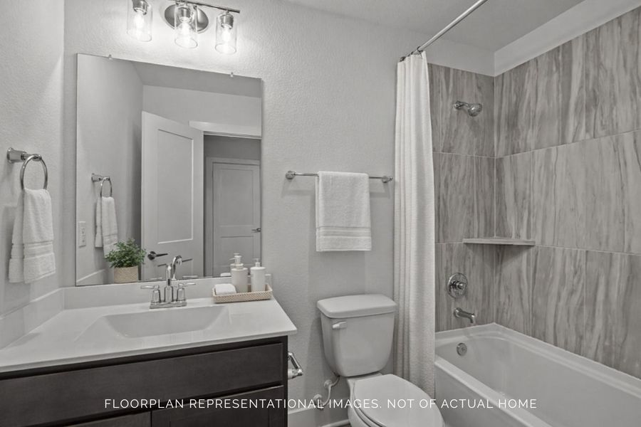 Furnished interior view inside a new home in Lone Star Landing, Montgomery (Image 12).