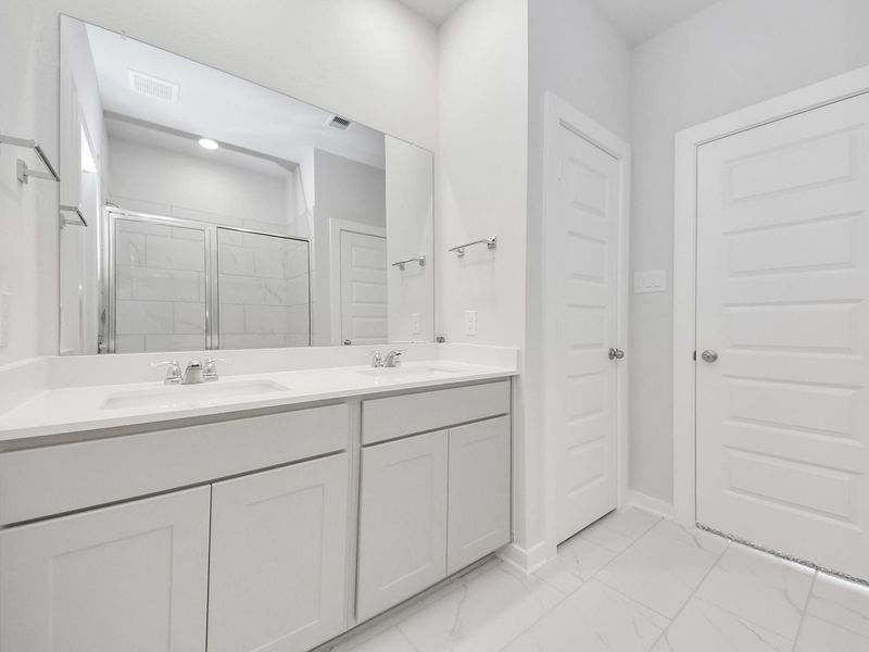 Furnished interior view inside a new home in Spring Branch Crossing, Conroe (Image 11).