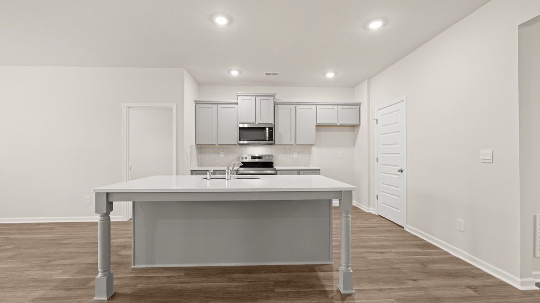 Representative furnished interior of a home built from the Aria by D.R. Horton in Champion's Run, Lithonia (Image 4).