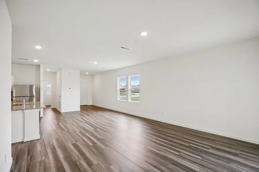 Spacious, unfurnished interior of a new home in The Trails at Carmel, Pflugerville (Image 10).