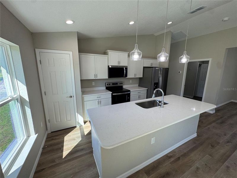 Furnished interior view inside a new home in , Dunnellon (Image 4).