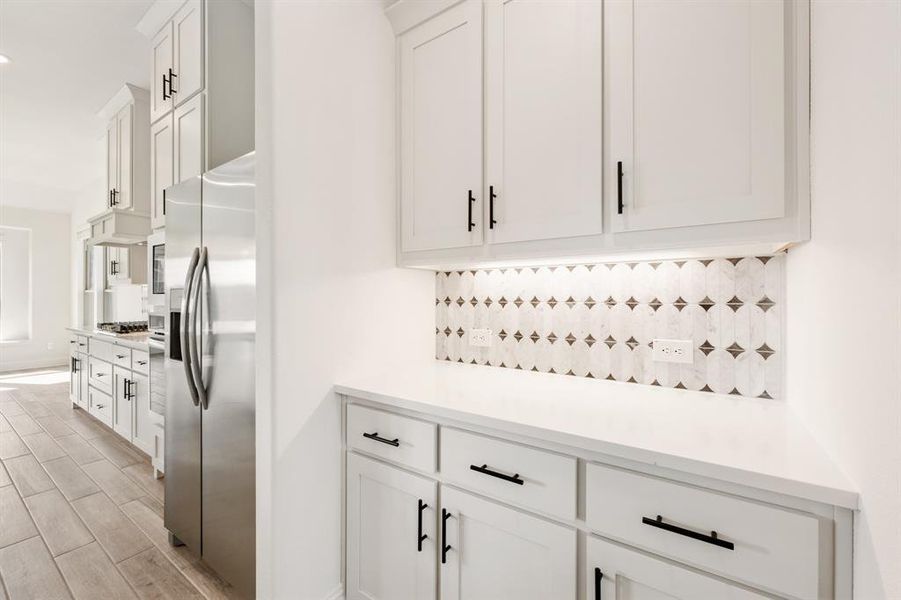 Butler's Pantry between Formal Dining Room and Kitchen Butler's Pantry between Formal Dining Room and Kitchen