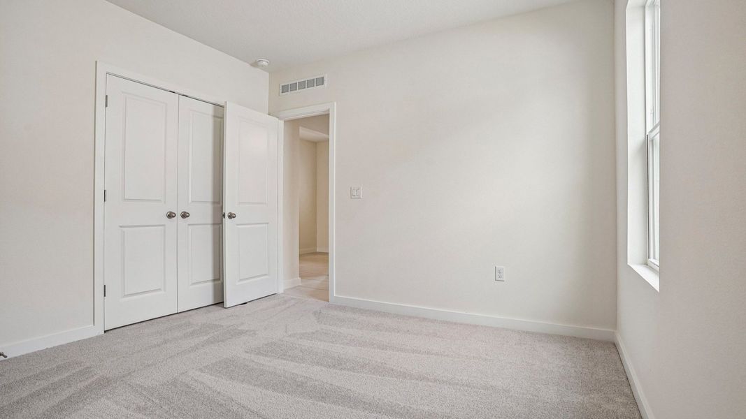 Furnished interior view inside a new home in Willowbrook North, Winter Haven (Image 28).
