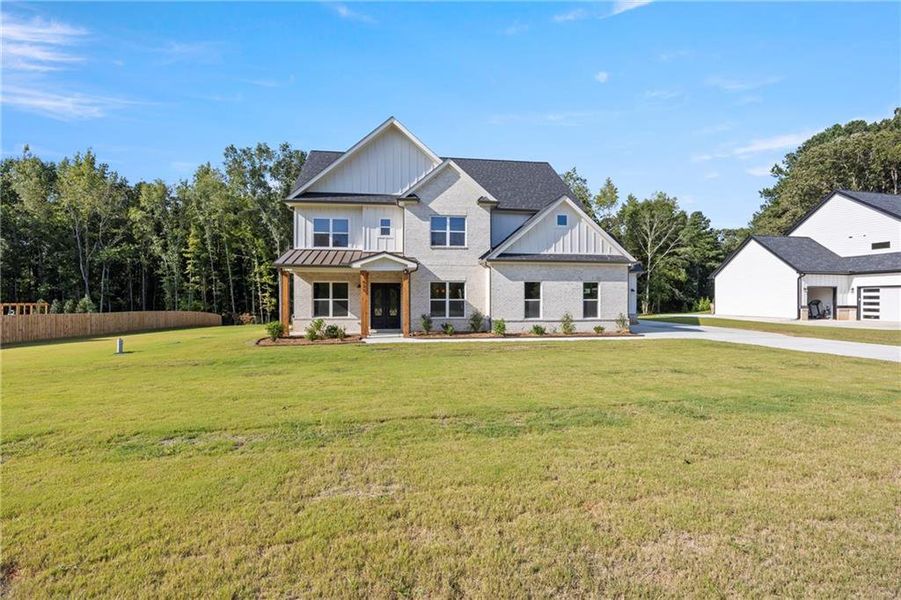 Front exterior of a new home in , Winder, GA, highlighting curb appeal (Image 25).