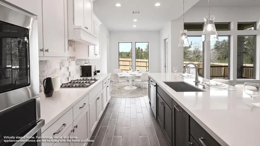 Representative furnished interior of a home built from the 3094W by Perry Homes in Briarley, Montgomery (Image 3).