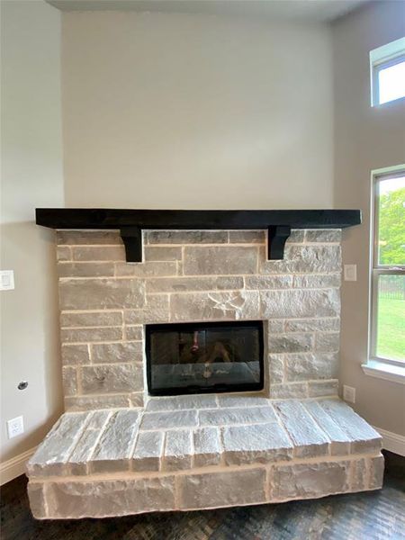 Gas stone fireplace with cedar mantle Gas stone fireplace with cedar mantle