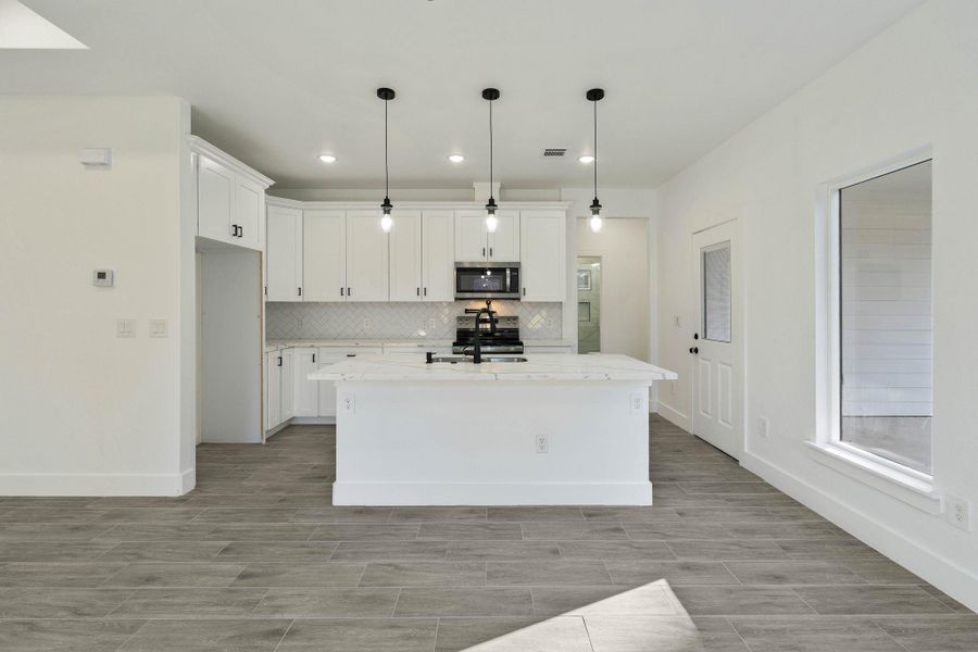 Furnished interior view inside a new home in , Willis (Image 8). Furnished interior view inside a new home in , Willis (Image 8).