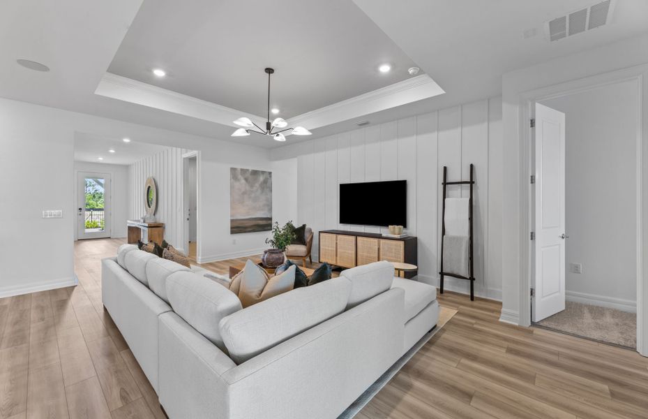Furnished interior view inside a new home in The Strand at Cedar Grove, North Port (Image 15). Furnished interior view inside a new home in The Strand at Cedar Grove, North Port (Image 15).
