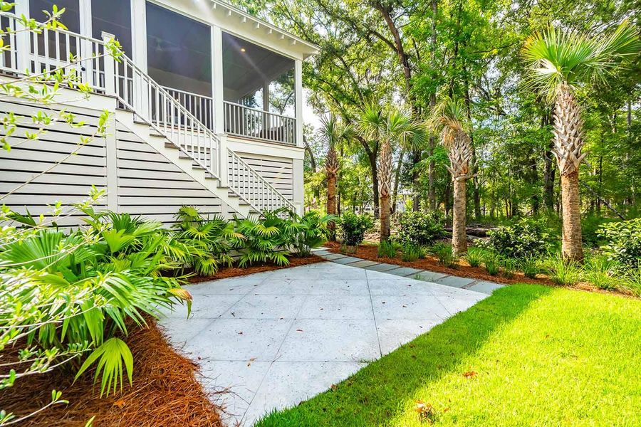 Exterior details and patio area of a home in , Johns Island (Image 26).