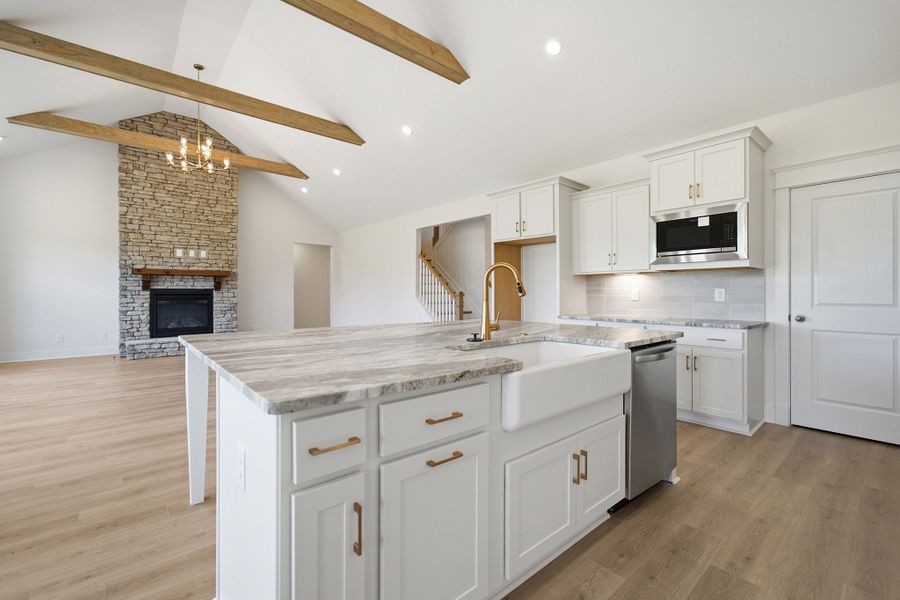 Furnished interior view inside a new home in Aden Woods, Fairview (Image 11).