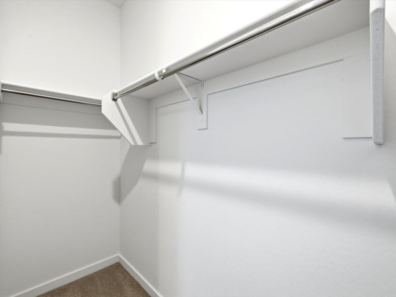 Spacious, unfurnished interior of a new home in Rancho Mirage Estate Series, Maricopa (Image 9).