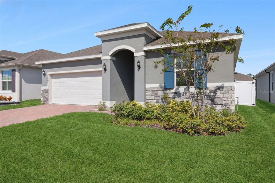 Exterior details and patio area of a home in Prairie Oaks, St. Cloud (Image 19).