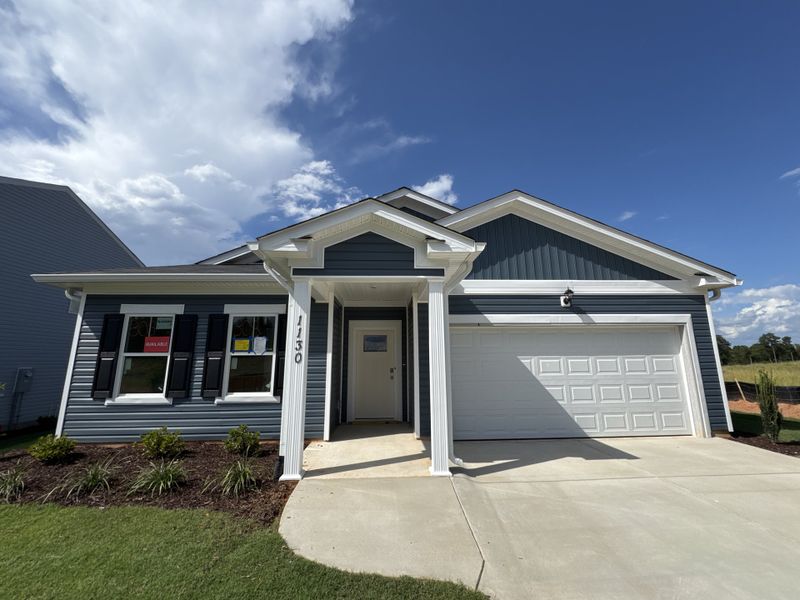 Front exterior of a new home in Declaration Homes at Tillery Park West, Grovetown, GA, highlighting curb appeal (Image 8). Front exterior of a new home in Declaration Homes at Tillery Park West, Grovetown, GA, highlighting curb appeal (Image 8).