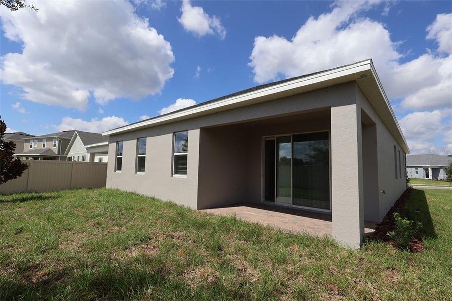 Exterior details and patio area of a home in Bay Lake Farms, St. Cloud (Image 4).