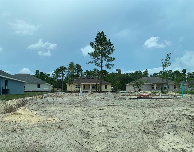 Front exterior of a new home in , Dunnellon, FL, highlighting curb appeal (Image 5).