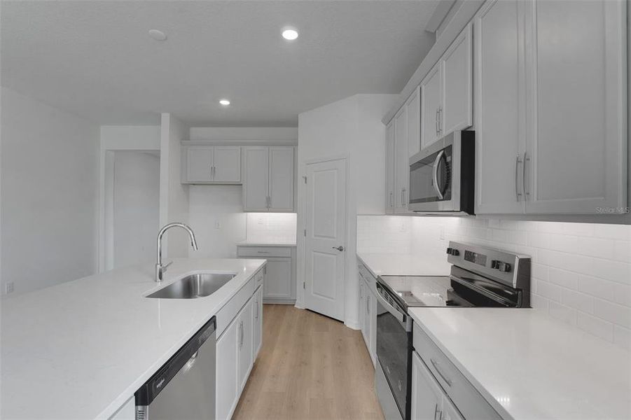 Furnished interior view inside a new home in Tuscan Hills, Dade City (Image 11).