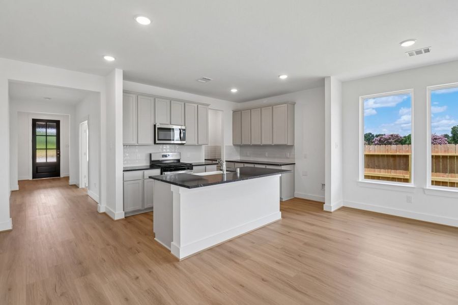 Furnished interior view inside a new home in Trinity Grove, Spring (Image 9).
