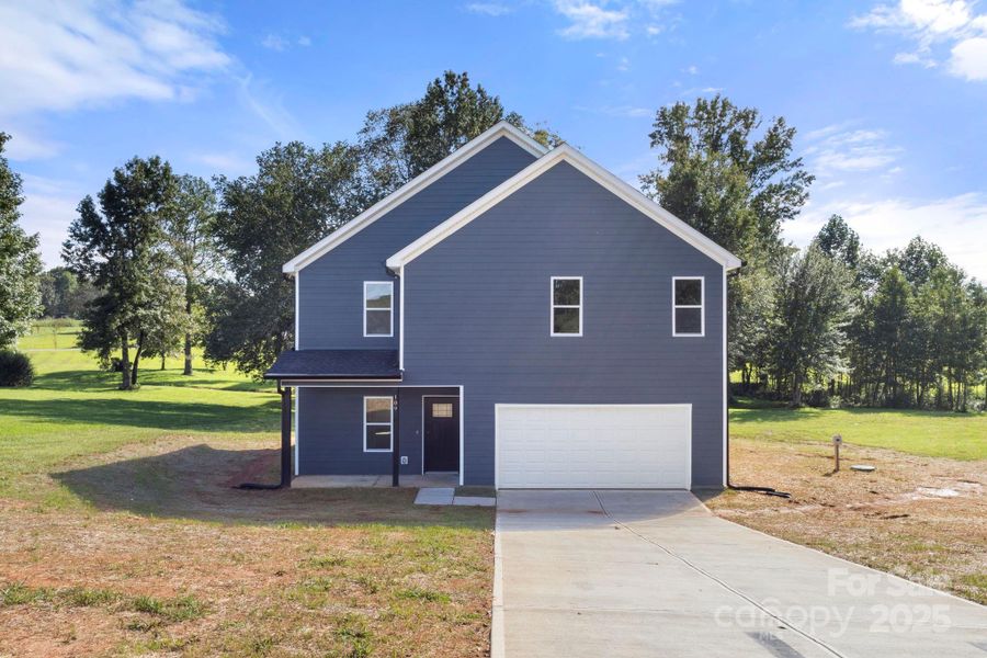Front exterior of a new home in , Shelby, NC, highlighting curb appeal (Image 17).