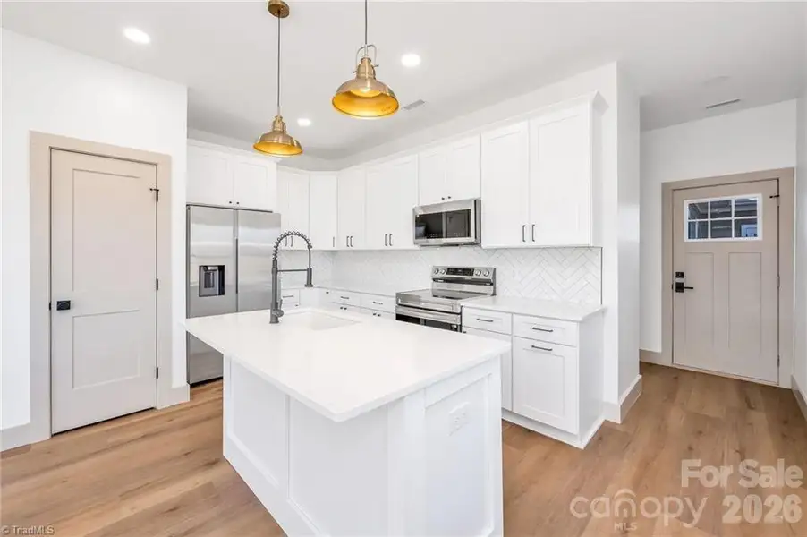 Furnished interior view inside a new home in , Hickory (Image 3).